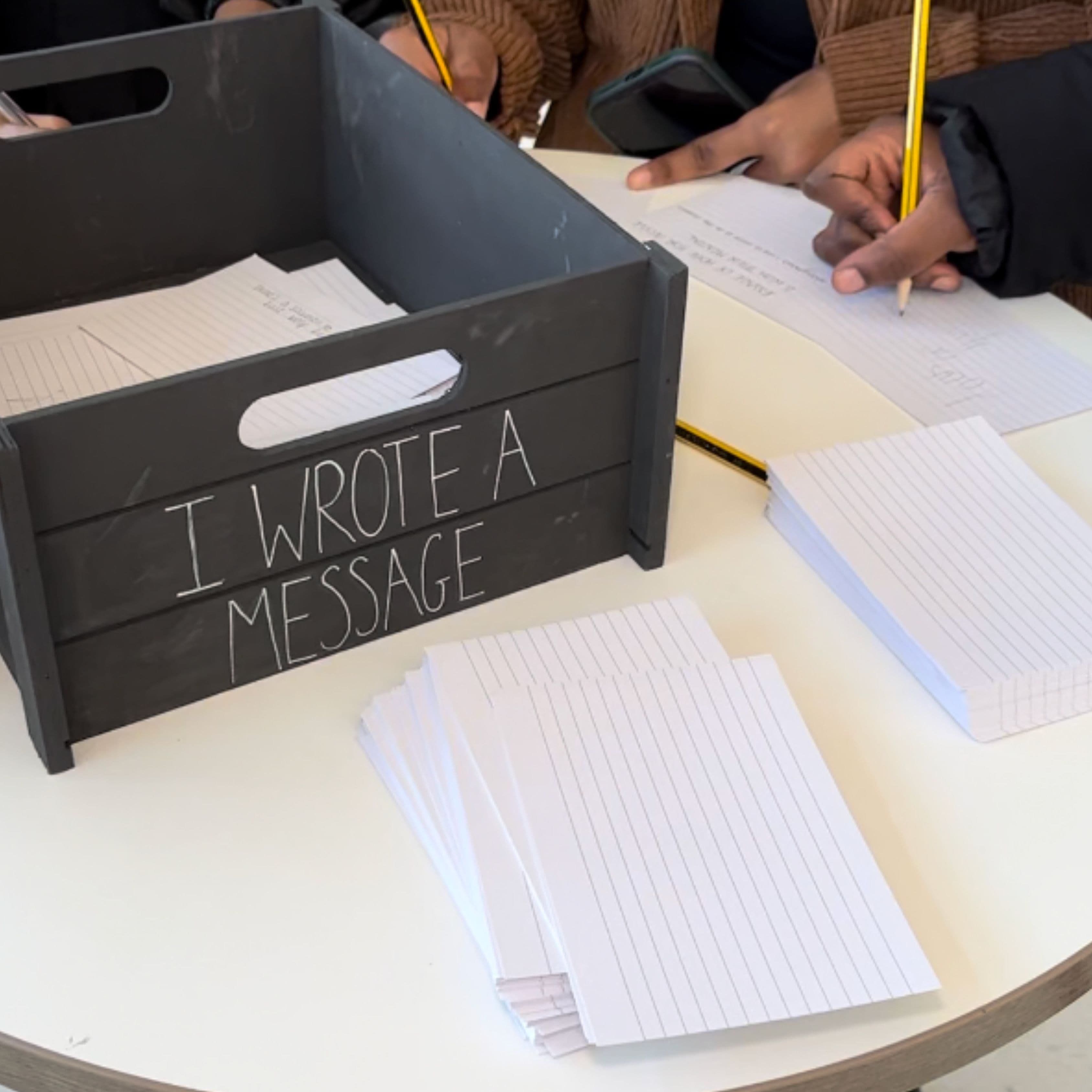 A crate filled with handwritten messages